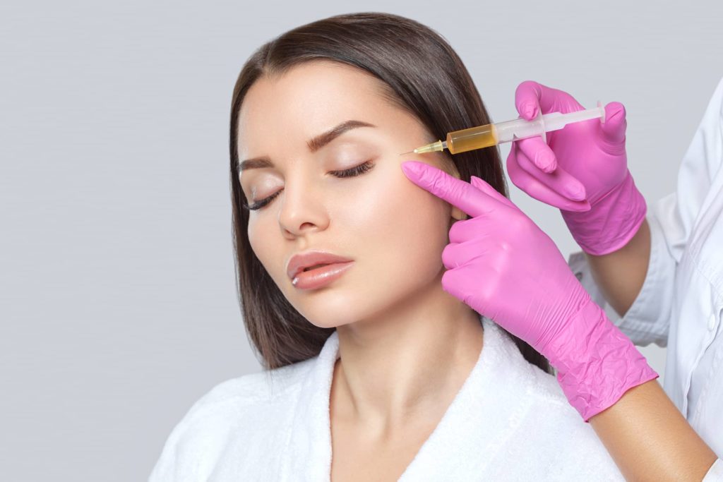 cosmetologist-does-prp-therapy-on-the-face-of-a-beautiful-woman-with-clean-skin-in-a-beauty-salon-there-is-in-vitro-blood-plasma cosmetologist-does-prp-therapy-on-the-face-of-a-beautiful-woman-with-clean-skin-in-a-beauty-salon-there-is-in-vitro-blood-plasma